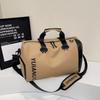 New multi-functional gym bag with separate compartments for wet and dry items, suitable for short trips, and featuring a large capacity and a stylish