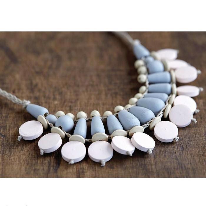 Perle bois Lucy rond plate 15x4,3mm 17 pièces