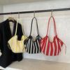 Textured hollow large-capacity bucket bag armpit bag for women as a new fashionable and versatile commuter woven tote bag