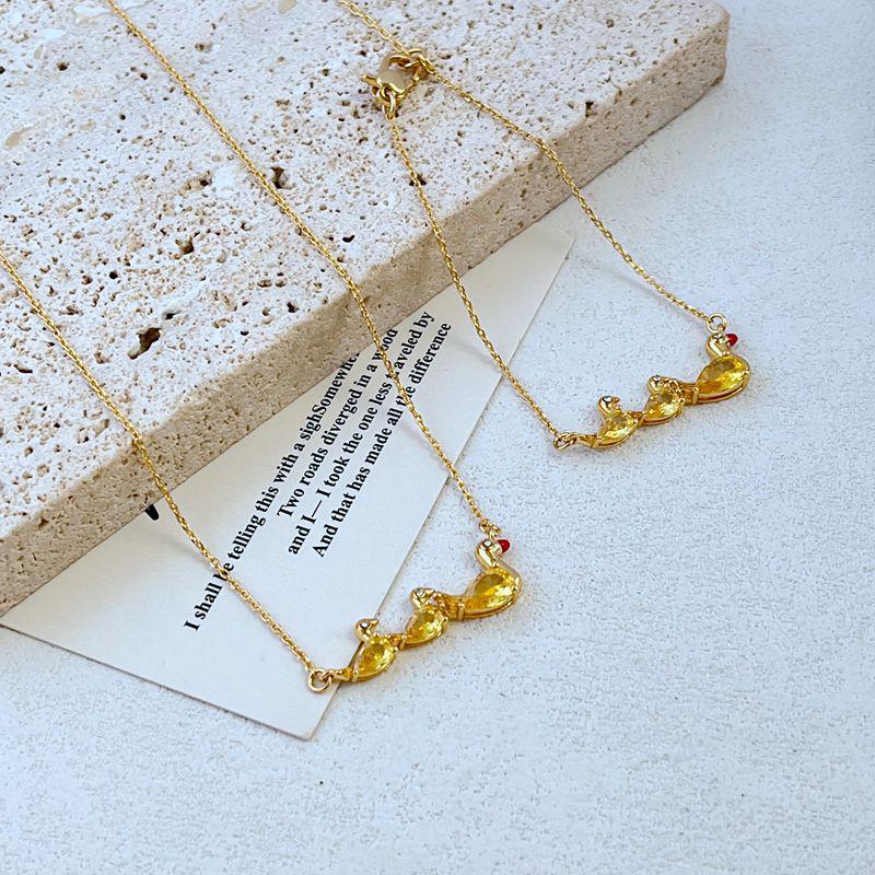 

Elegant Zircon-Inlaid Yellow Duck Necklace & Bracelet Set