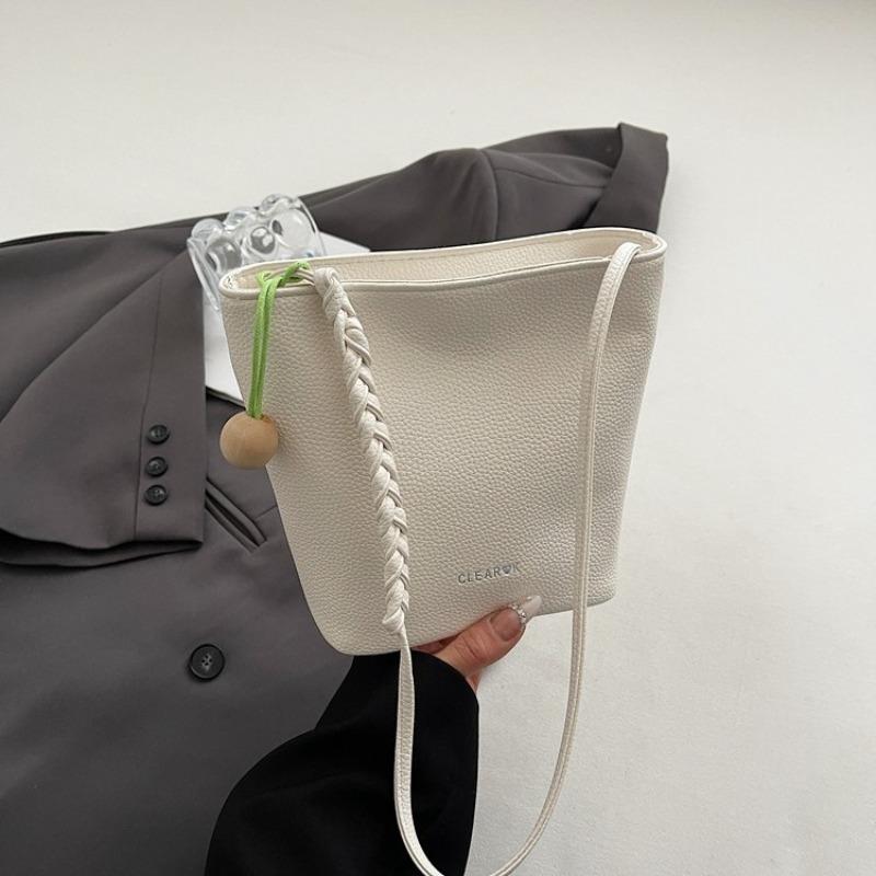 New large-capacity sense retro versatile bucket bag women's fashion shoulder work commuter messenger bag bag