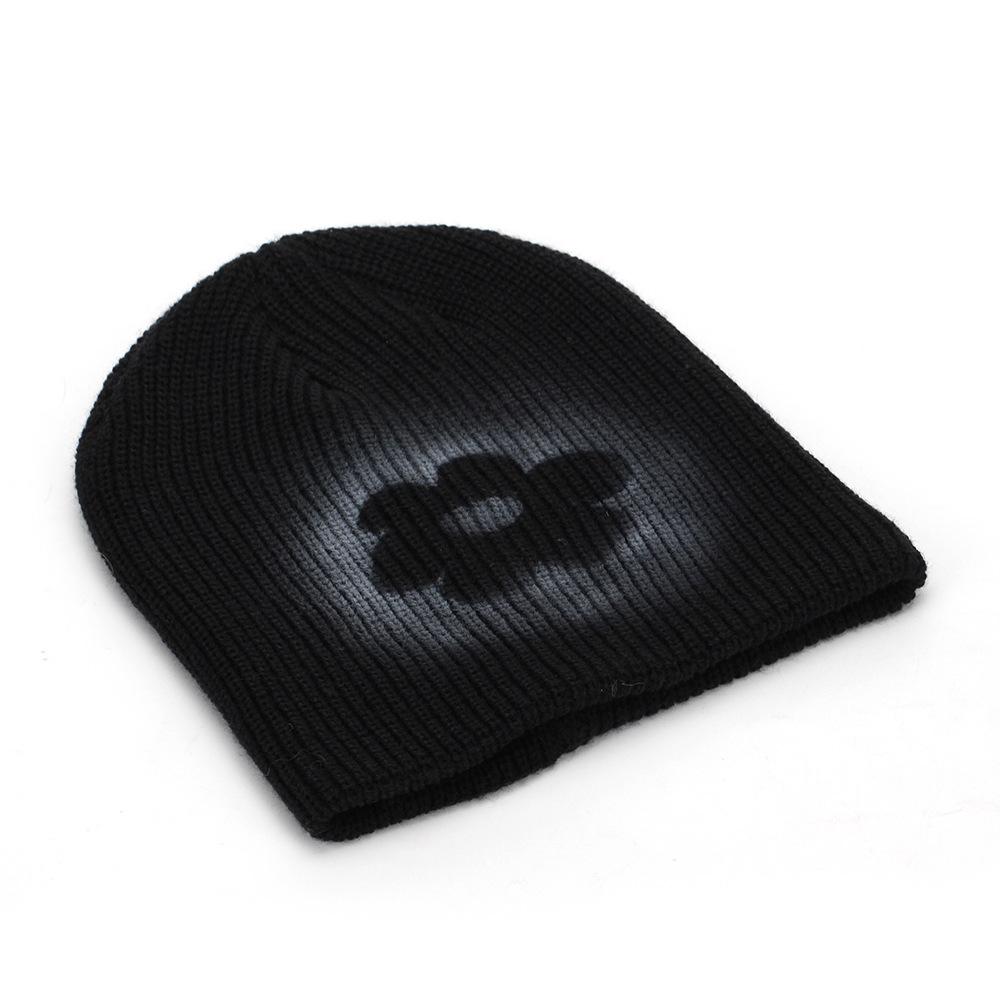 New solid color flower jacquard hat women's autumn and winter warm wool hat Internet celebrity windproof hat manufacturer knitted hat