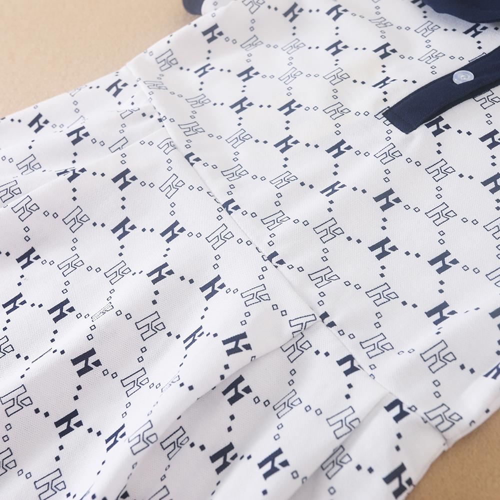Flickornas tryckta pikétröja klänning med marinblå krage Kortärmad A-linjeformad klänning med monogrammönster Barnvita sommarklänningar