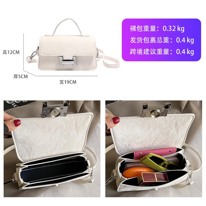 Beliebte Nischentaschen Neue Damentaschen Vielseitige Umhängetaschen Modisches Muster Kleine quadratische Taschen