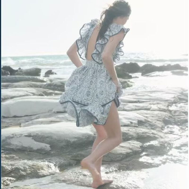 Zbzr Spring New Women Clothes Western Style Print Lotus Leaf Trim Sexy Backless Laminated Cake Skirt Long Dress