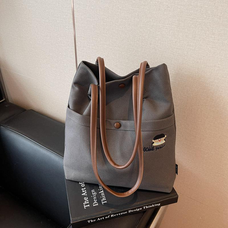 Casual versatile canvas bag women's new light commuter shoulder bag large capacity tote bag