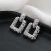 Elegant 18K Gold Stud Earrings with Modern Luxury Design