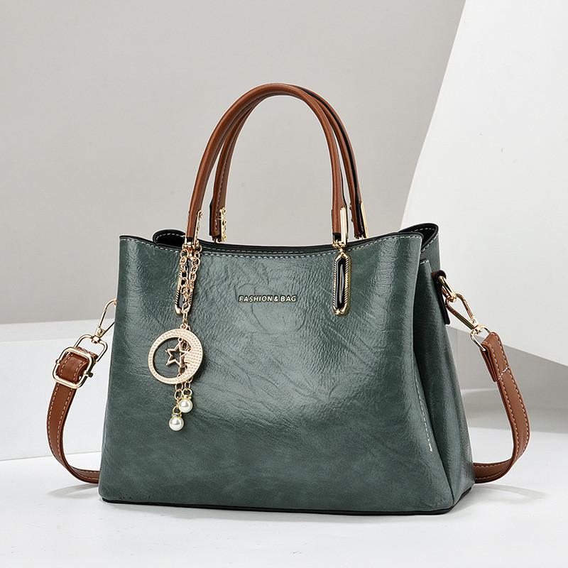 Chic Vintage Inspired Pu Handbag For Women With Ample Space And Trendy Design