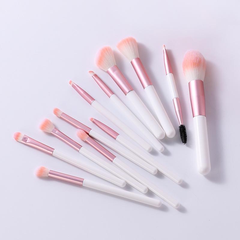 

12-Piece Clear Sky Makeup Brush Set with Soft Pink Heart Storage Bag – Includes Blush & Eyeshadow Brushes.