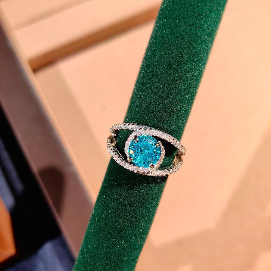 

Fashion Light Luxury Tanzanian Blue Crushed Ice Flower Cut Ring Inlaid With High Carbon Diamonds Bird S Nest Cut Simple Temperament Sea Blue