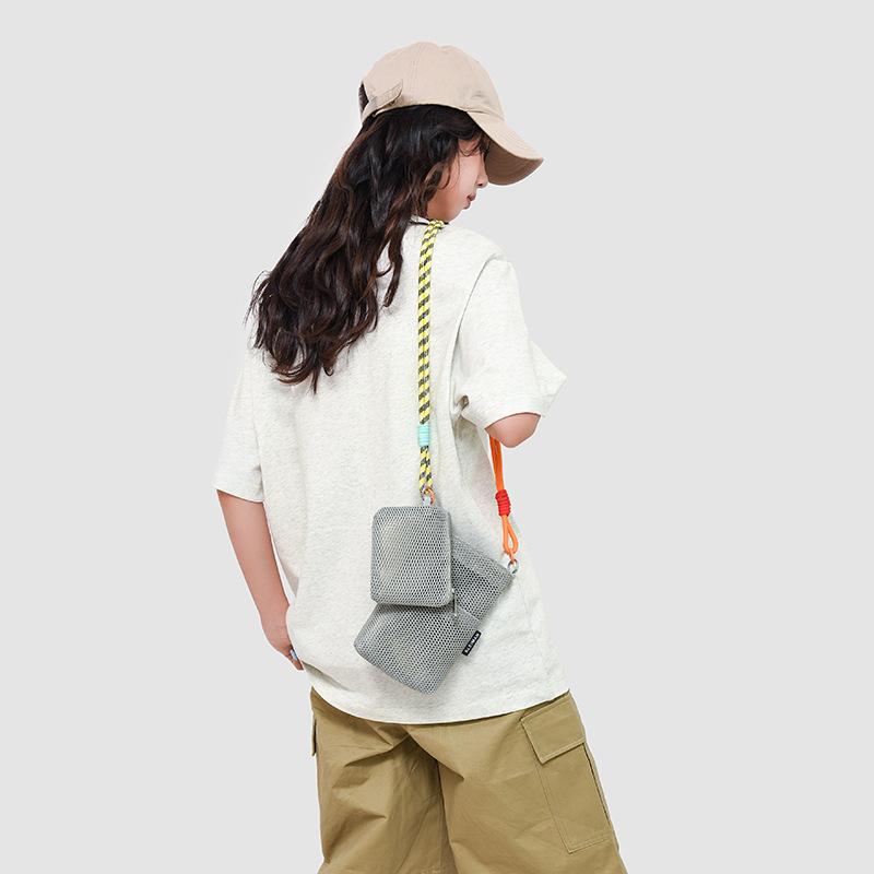 Niche hollow bag women's summer new fashion messenger bag high-end sense child and mother mobile phone bag