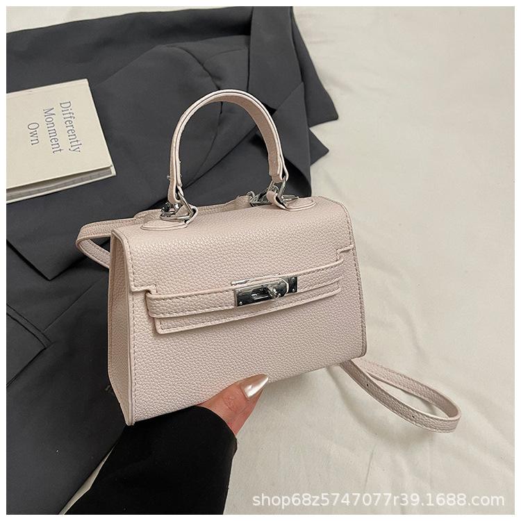 

Bag women s new high-end portable Kelly bag 2025 early spring new foreign-style versatile shoulder messenger bag белый