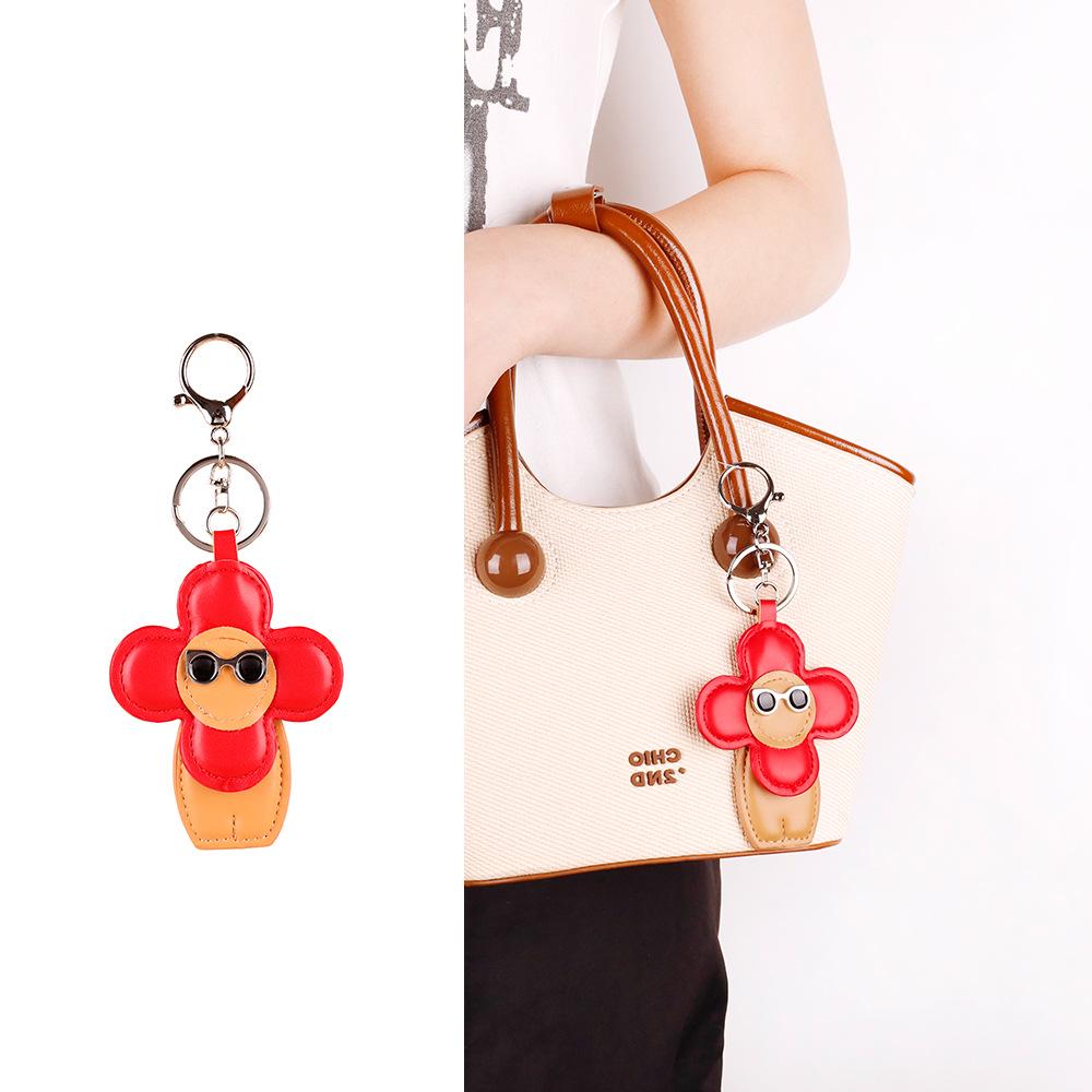 

Winter Sweet Cool Flower Lion Leather Keychain Pendant