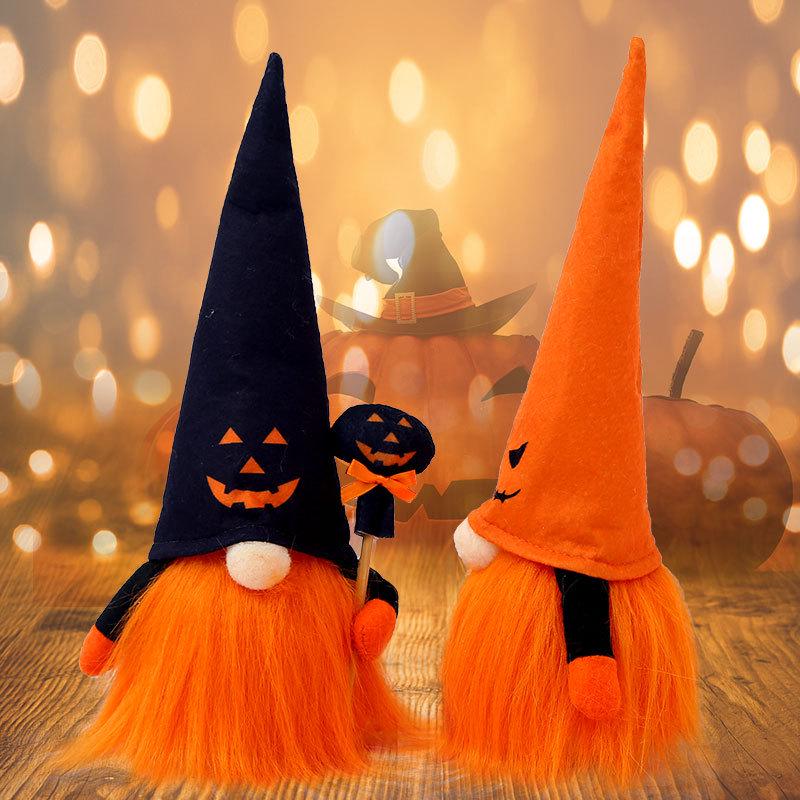Luminous Ghost Face Halloween Doll Figurine with Rudolph Pendant for Window Display.