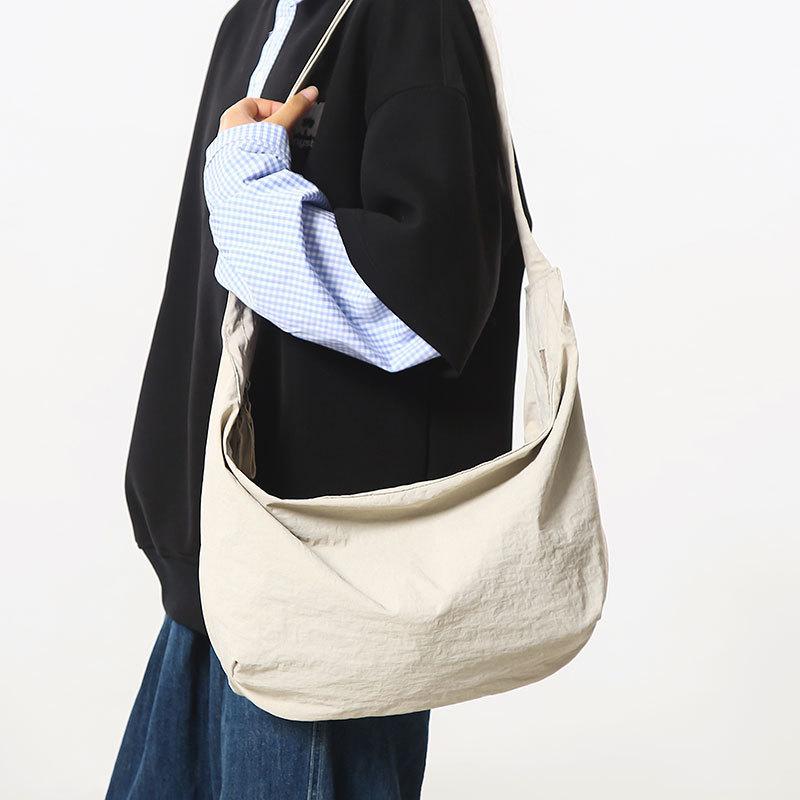 New Product Simple Solid Color Nylon Cloth Dumpling Bag Large Capacity Light Leisure Versatile Commuter Travel Messenger Bag