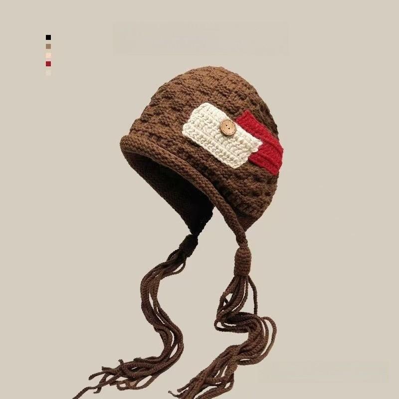 

Handcrafted Knit Hat For Women With Tassel Details And Buttons For Winter Warmth коричневый