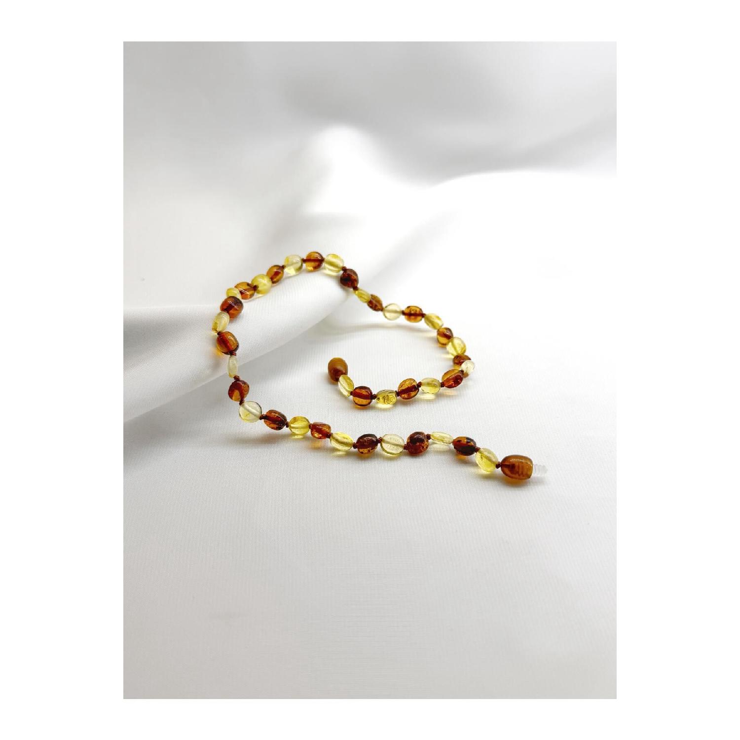 

Ожерелье в виде детских зубов Dk06