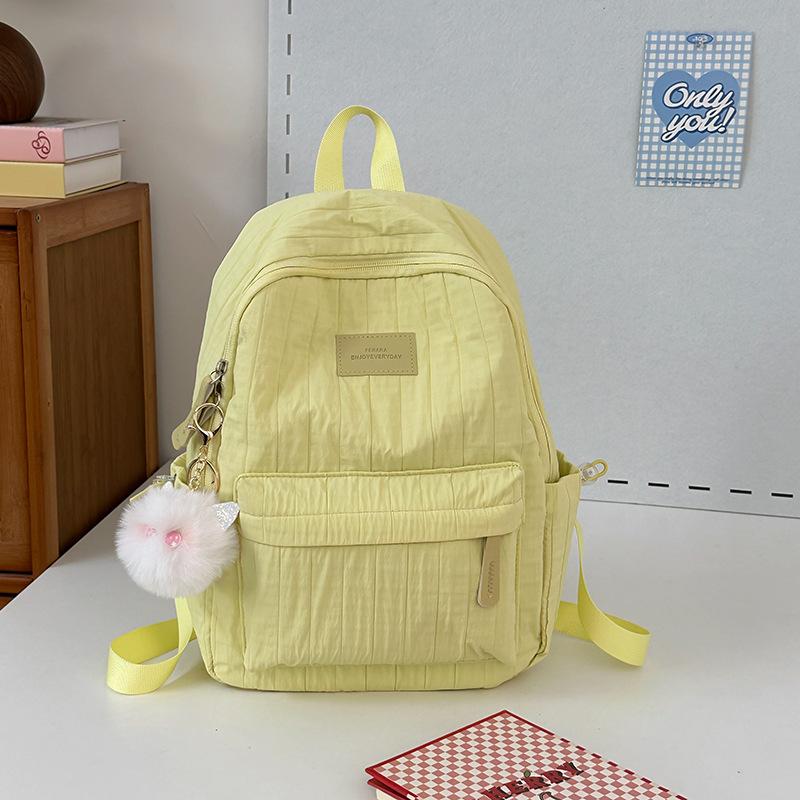 School bag junior high school girls large capacity solid color light primary school backpack high value girl versatile backpack