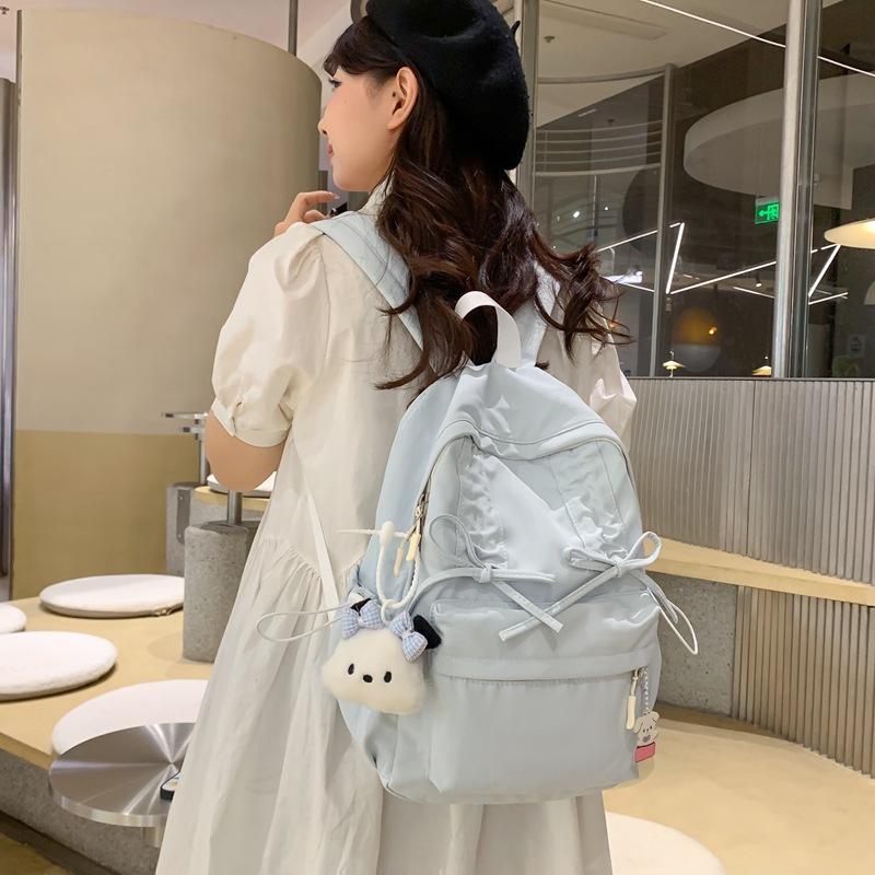 Niche design schoolbag female college student pleated drawstring bow class backpack backpack women's travel backpack