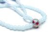 Japanese-made Soka Gakkai prayer beads set, perfect as a gift for new members. Includes a pink and cherry blossom design on the beads and a light blue