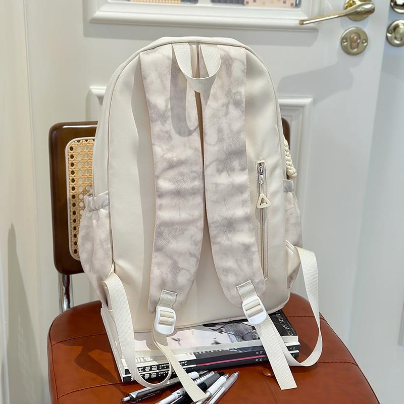 School bag 2025 new tie-dye backpack Korean version fashionable and cute large-capacity school bag casual simple backpack