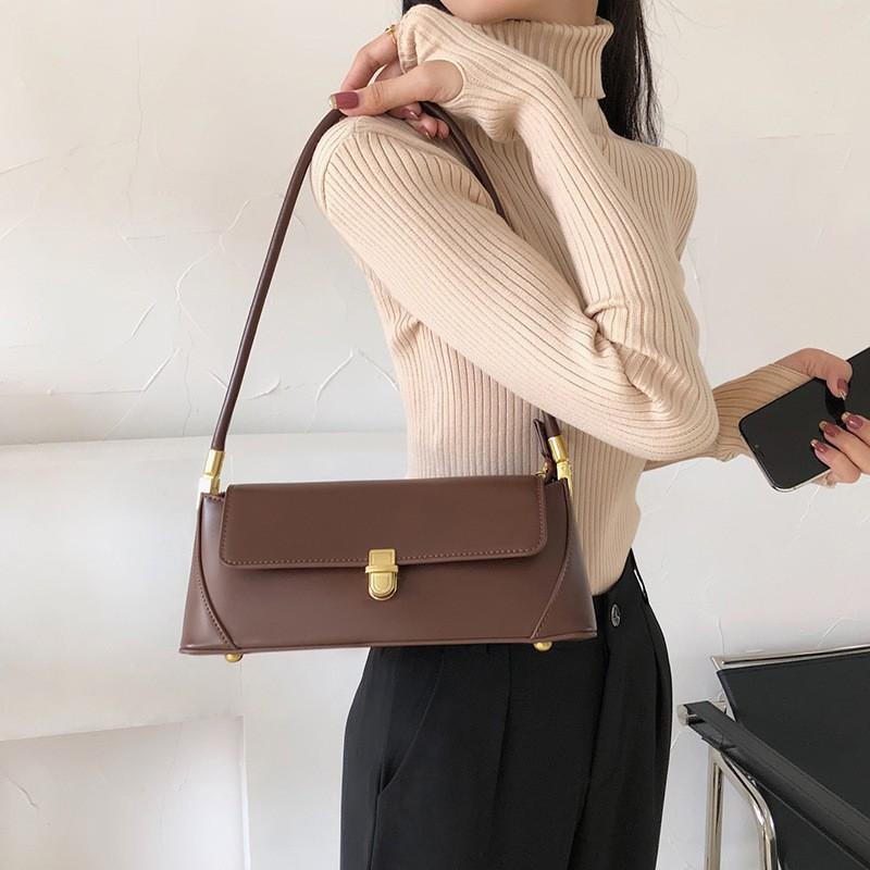 

2025 New Fashionable Armpit Bag Women With A High-quality French Niche Ins Super Hot Western-style Single-shoulder Stick темно-коричневого