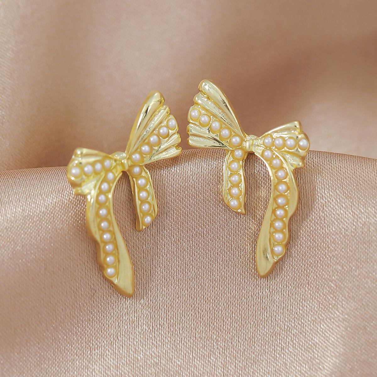 Eco-friendly Gold Bow Earrings with Rhinestone and Pearl Stud