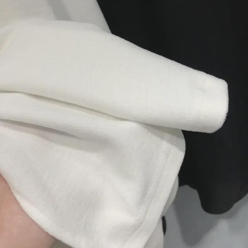 Top holgado de manga larga con escote en V y abertura media para mujer (otoño 2023)