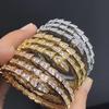 Schlangenform Weibliche Schlangenknochen Drei-Kreis-Öffnung Leichter Luxus Nische Schlangenkopf Federarmband