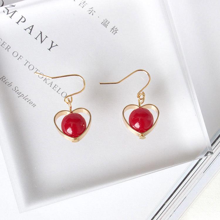 

Minimalist Red Agate Heart-Shaped Drop Earrings: European & American Style, Hollow Design for Women Plated