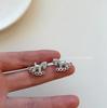 Diamond-Studded Silver Needle Horse Earrings: Elegant, Versatile, and Luxurious