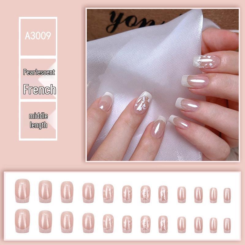 

Translucent Pearlescent Crescent White Press-On Nails with Flower Embellishments