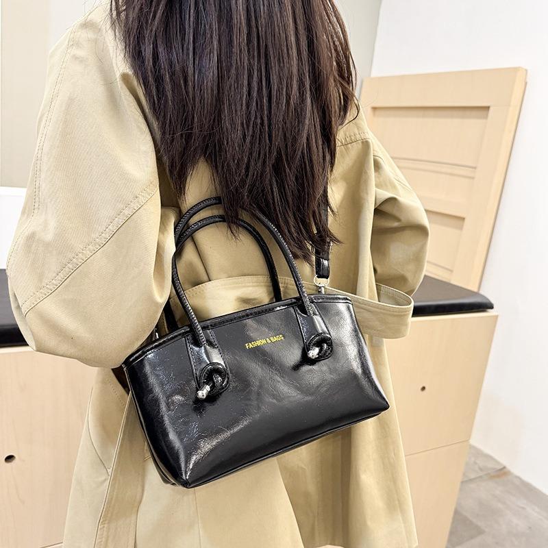 New retro niche design portable bucket bag temperament personality simple casual messenger bag bag women