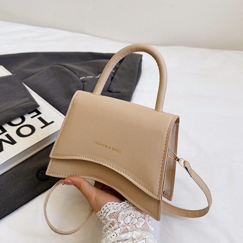

Women s bag 2025 summer simple new fashion versatile underarm small square bag high sense niche shoulder messenger bag білий