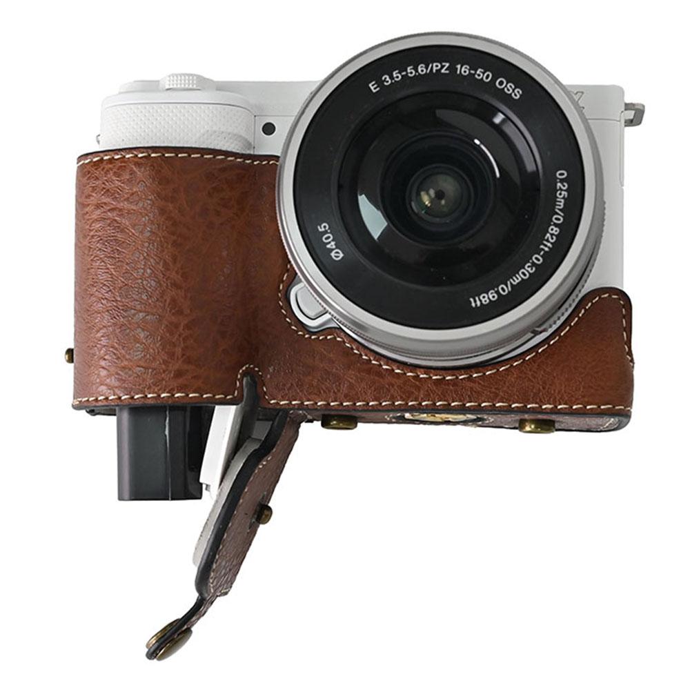 Pouzdro na fotoaparát Sony Alpha ZV-E10 Kožený kryt s texturou liči s otvorem pro baterii + Popruh