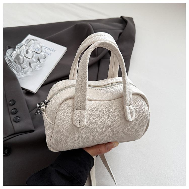 

Fashion pebbled pattern hand-held Boston bag women s 2025 new niche design crossbody bag foreign style commuter shoulder bag