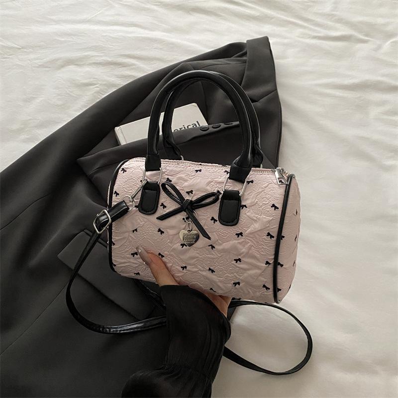 

Sweet bow seersucker Boston bag women s Korean sweet girl handbag versatile shoulder messenger bag рожевий