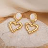 European & American Titanium Heart Cat's Eye Earrings - Hollow Exaggerated Design, Versatile and Exquisite Women's Jewelry