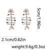 Ocean vacation style unique personality dripping alloy fish skeleton earrings niche versatile fashion simple women's models