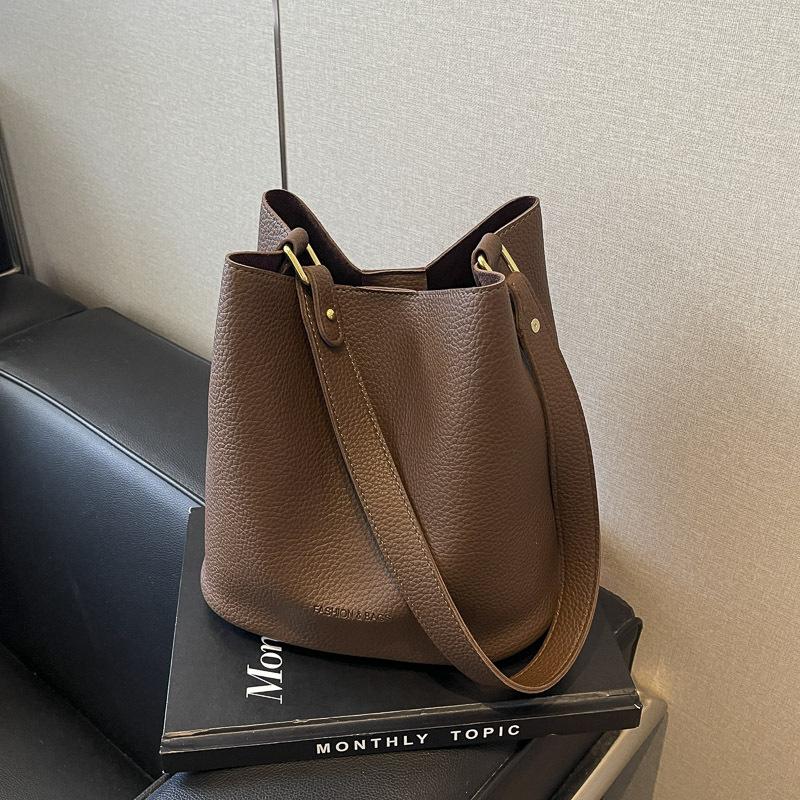 

В этом году популярная женская сумка-ведро через плечо 2025 новая работа большая вместимость высококлассная сумка-мессенджер