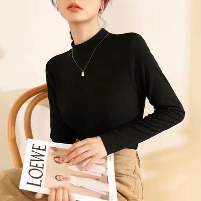 Haut à manches longues et col montant slim pour femme