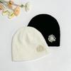 Women's Pearl Beaded Floral Dumble Beanie