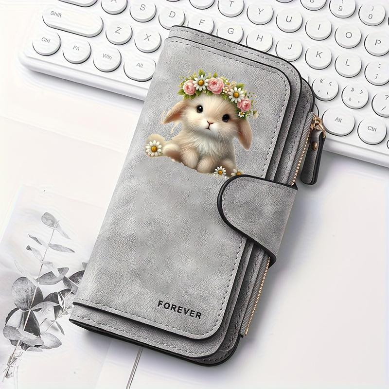 Easter Bunny Women's Long Wallet features a flip cover design. This multifunctional wallet is perfect for Easter celebrations and comes with a