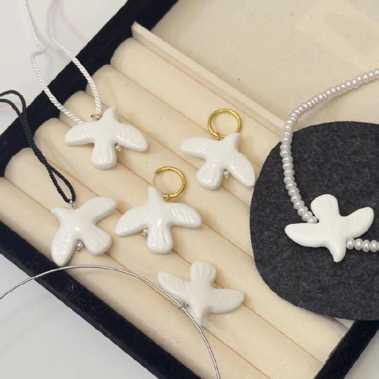Stylish White Doves Pendant Necklace With Branch Accent Designed For Those Who Appreciate Individuality And Depth