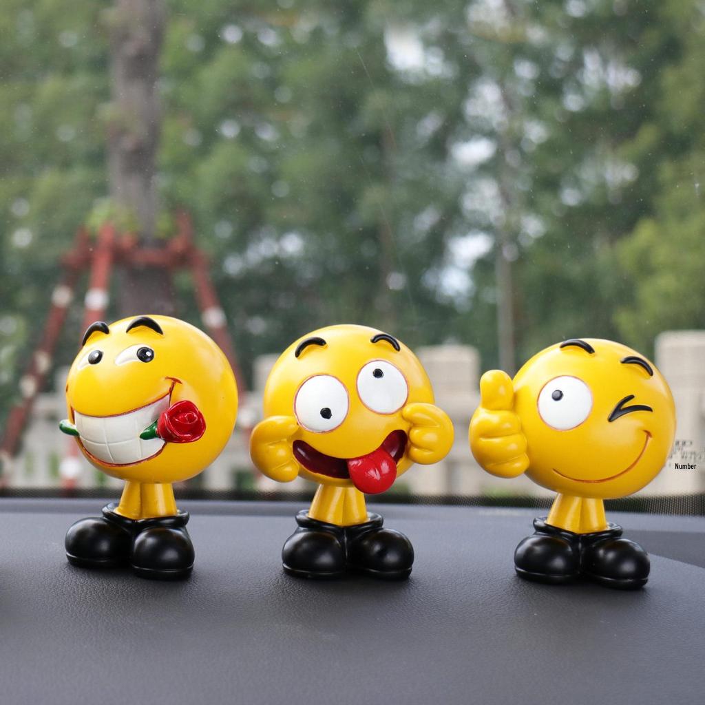 Ha Hu Emoji Bobblehead Car Ornament: Cute Cartoon Interior Decoration.