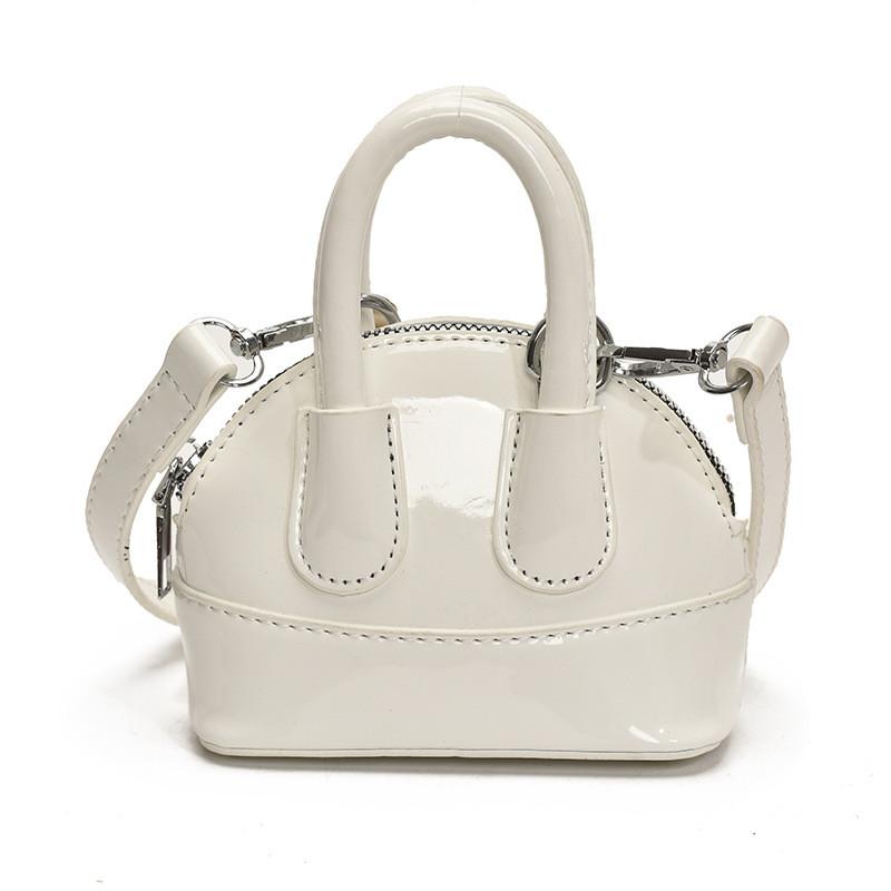 

Modern Pu Shell Handbag With Stitch Detailing And Compact Design For Casual Outings