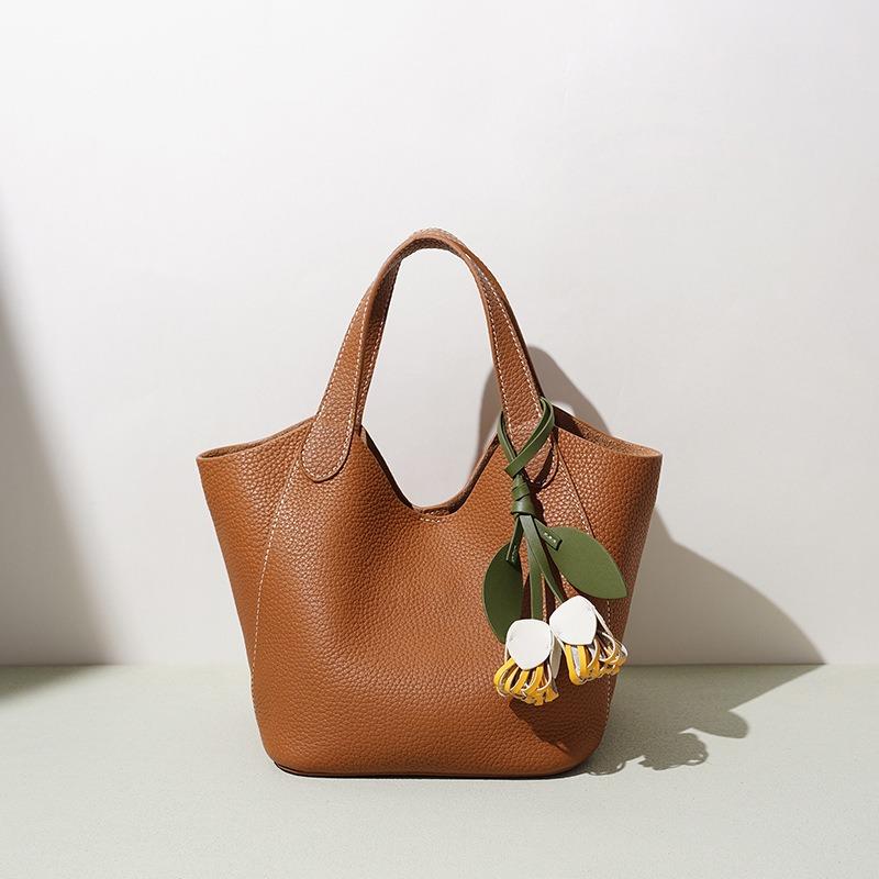Bolso de mujer de piel de vaca de primera capa, bolso de hombro casual y simple, bolso cruzado de cuero con sensación de nicho, bolsa tipo cesta de verduras de cuero