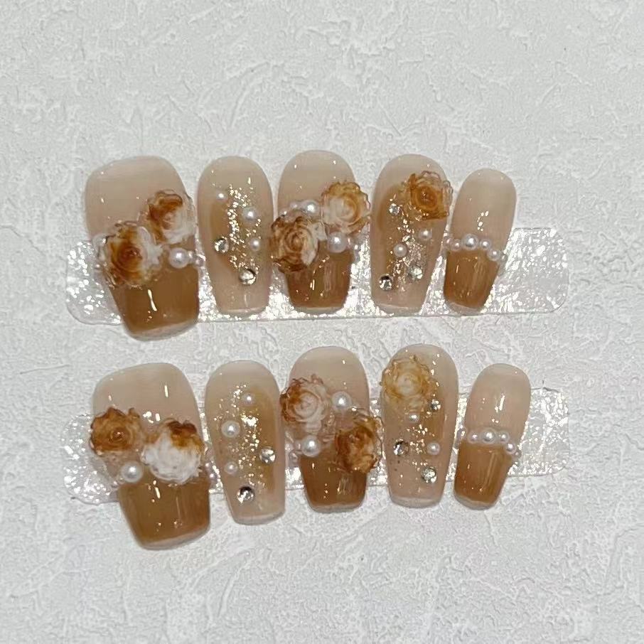 

Цветы и парча Носимые накладные ногти Ручная работа Высококлассные Карамельного цвета Французский розовый Маникюр Накладные ногти Съемные Large L