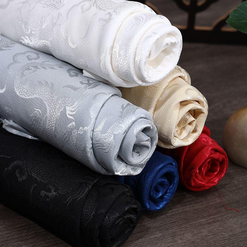 High-end dragon-patterned jacquard satin fabric suitable for wedding dresses formal gowns and designer clothing fabrics