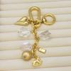 Gold-Plated Ladybug Charm Keychain - Creative, Rich Design with Pendant Ball